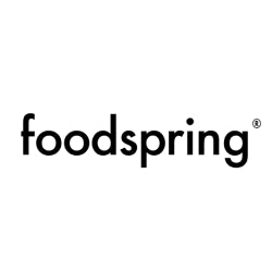 schwarzes foodspring Wortmarke in schlichter Schrift auf weißem Hintergrund