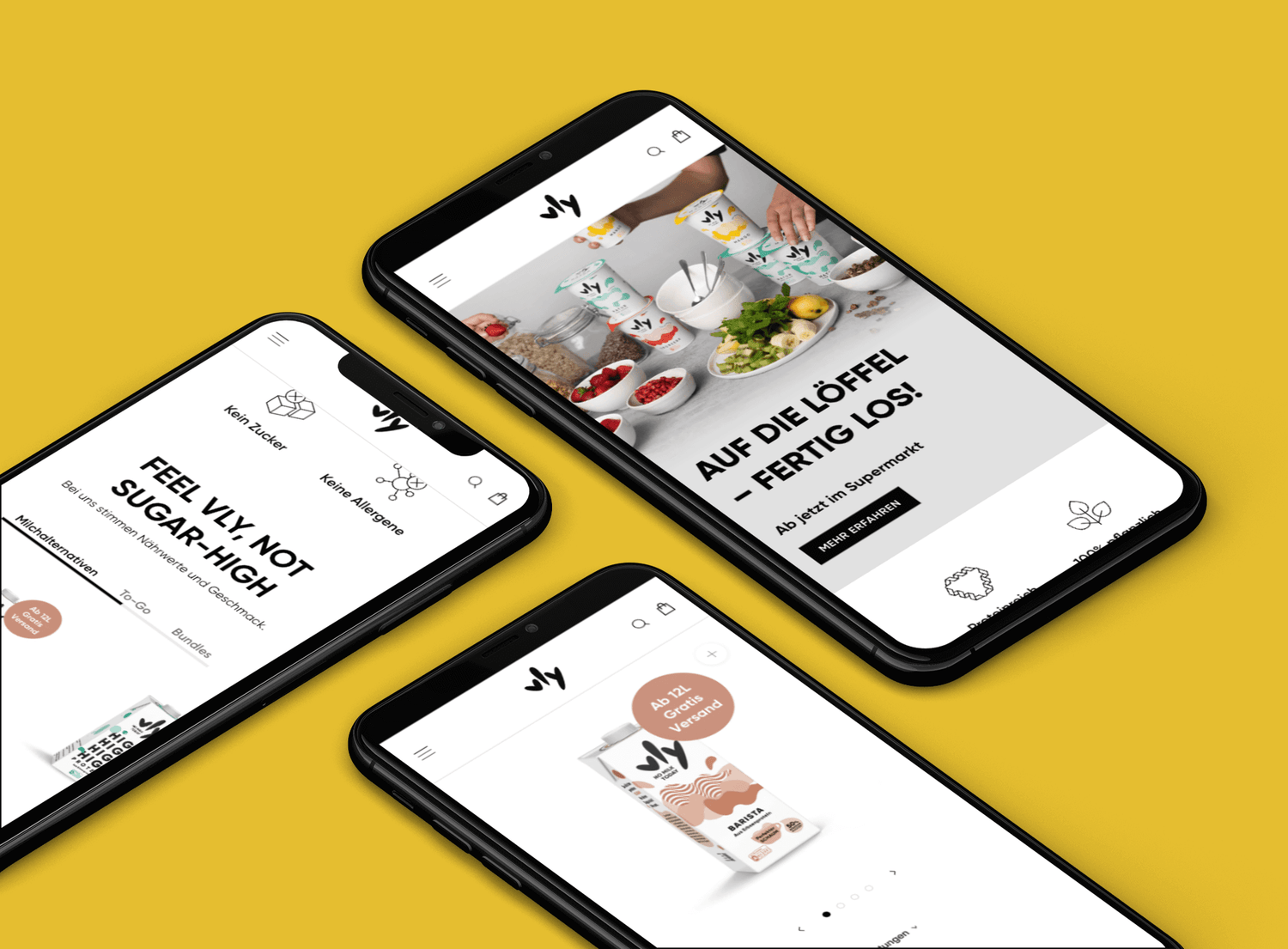 Drei schwarze Smartphones auf gelbem Grund zeigen Webseite mit veganen Milchalternativen Joghurtbechern Müslischalen und Werbeslogans
